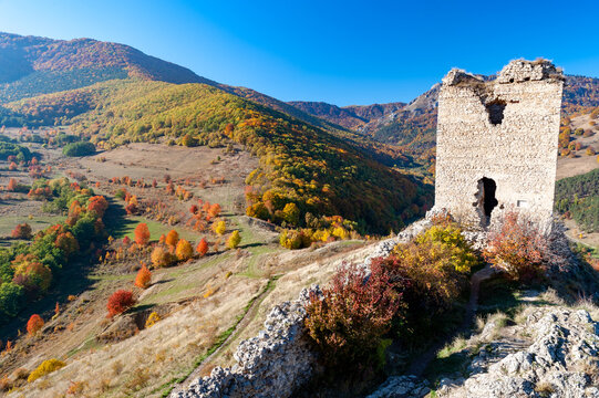 autumn landscape with trascau fortress ruins, romania, coltesti village