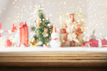 Wooden table with Christmas background