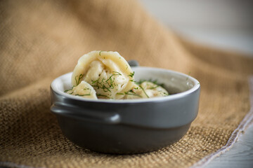 boiled dumplings with meat filling in a bowl