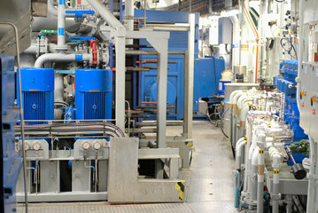 Valves and Pumps inside Engine Machinery Room on modern Ship