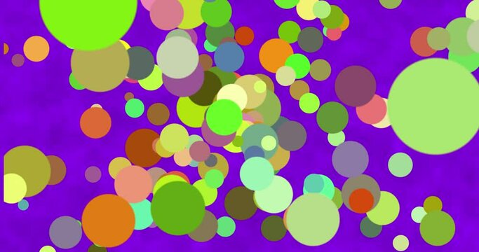 4k Seamless looped video. Multicolored balls moving fast on a purple background 