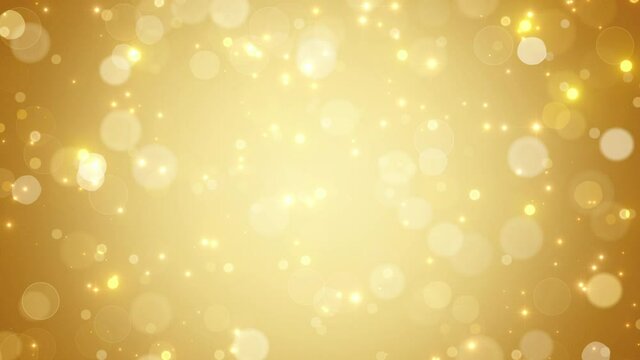 rich gold particles sparkle light background