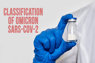 A doctor holds vaccine against new covid-19 omicron variant. New generation vaccine against Coronavirus South African variant. Omicron variant of SARS-CoV-2. New B.1.1.529 Variant of concern