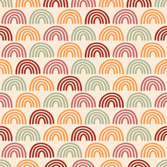 Seamless pattern with hand drawn rainbows