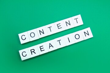 an elongated letter arrangement with the word content creation