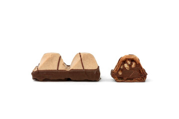 Pyramid shaped chocolate filled waffle cookies isolated on white background.