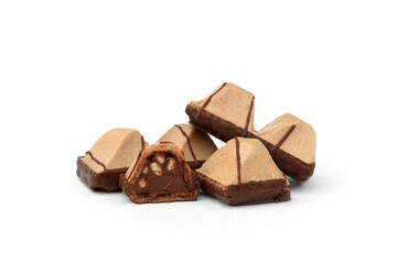 Pyramid shaped chocolate filled waffle cookies isolated on white background.