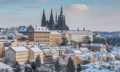 Prague in winter - view of snowy Hradcany and Prague Castle - obrazy, fototapety, plakaty