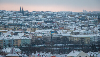 Prague in winter - view of the snowy city from Prague Castle