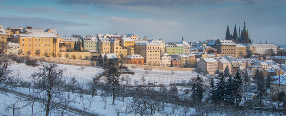 Obraz premium Prague in winter - view of snowy Hradcany and Prague Castle