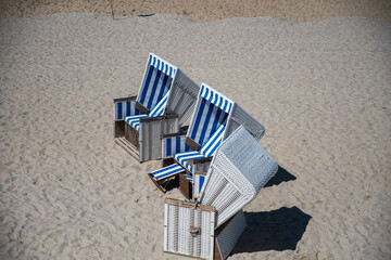 three beach chairs on the sandy beach