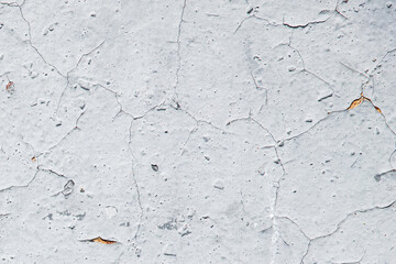 Old wall with peeling plaster, grunge background