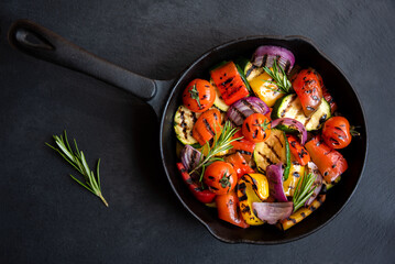 Grilled mixed vegetables, cooked peppers, zucchini, tomatoes and onions. Healthy vegetarian food