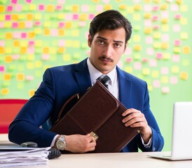 Businessman with many conflicting priorities