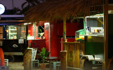Food trucks on street. Eats outdoor in tropical country.