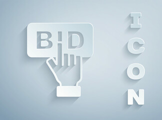 Paper cut Bid icon isolated on grey background. Auction bidding. Sale and buyers. Paper art style. Vector