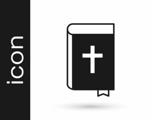Black Holy bible book icon isolated on white background. Vector