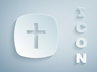 Paper cut Christian cross icon isolated on grey background. Church cross. Paper art style. Vector