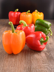 Vegetables on table. Pepper orange, red, green color.