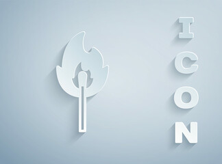 Paper cut Burning match with fire icon isolated on grey background. Match with fire. Matches sign. Paper art style. Vector
