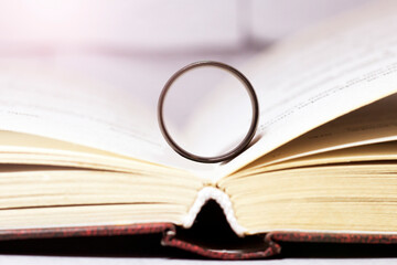 The Black Ring and the open book