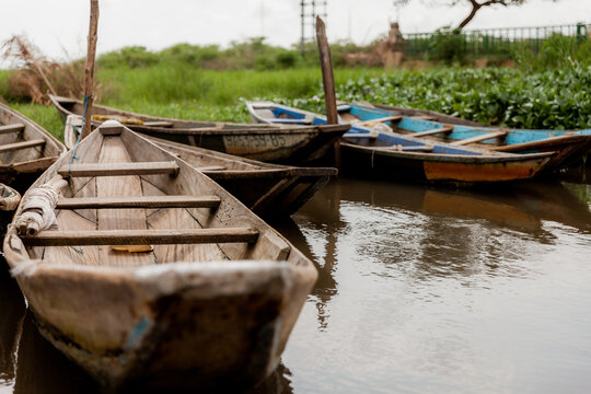 Pirogues or boats on Lake Nokoue parked at market for the day in Benin, Africa. 