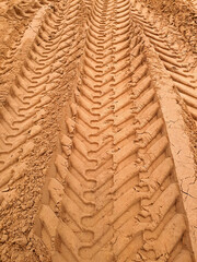 a tractor wheel track on the send