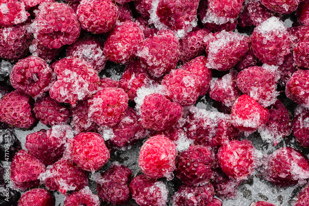 Wall mural frozen raspberry, top view. juicy raspberries, background.