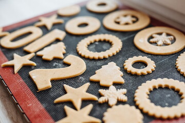 Christmas cookies. Making gingerbread cookies for Holidays. Gingerbread dough. Christmas Baking background. Form for cutting gingerbread. Merry Christmas and Happy Holidays. Selective focus