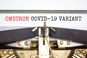 Covid-19 new omicron virus variant symbol. Concept words Omicron covid-19 variant typed on retro...