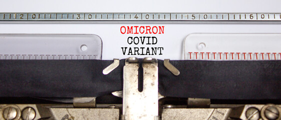 Covid-19 new omicron virus variant symbol. Concept words Omicron covid variant typed on retro...