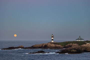 November Full Moon over the Illa Pancha lighthouse and hotel, in Ribadeo, Galicia, Spain!