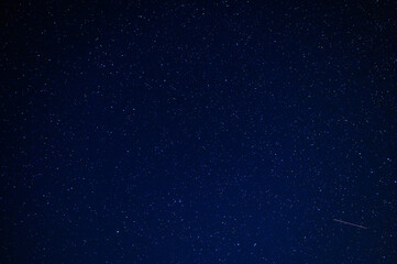 Night starry sky with stars, constellations, nebulae and galaxies at night. Abstract dark blue...