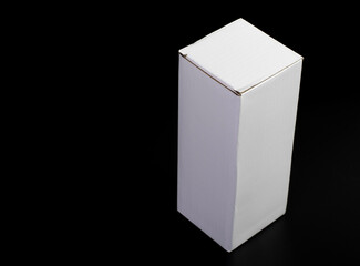blank packaging white cardboard box for product design mock-up isolated on black background