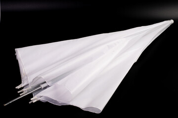 White umbrella reflector or flash soft box equipment for photo studio