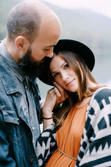 Man stroking a pregnant woman cheek. Portrait