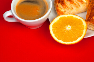 a cup of coffee with orange	