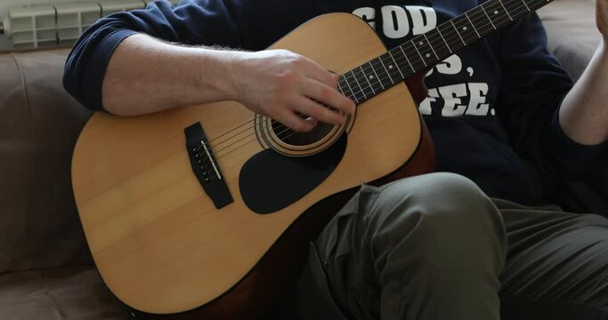 Acoustic guitars playing. Music concept. Guitars acoustic. Live music. Music festival. Male musician playing guitar, music instrument. 