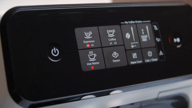Turning on coffee machine time lapse closeup
