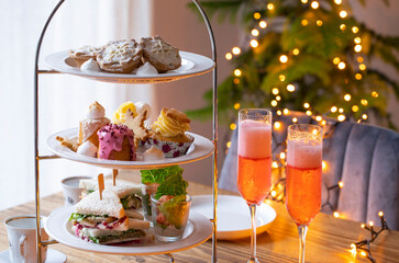 Christmas afternoon tea with mince pies, cakes,  turkey sandwiches and mini crayfish cocktails