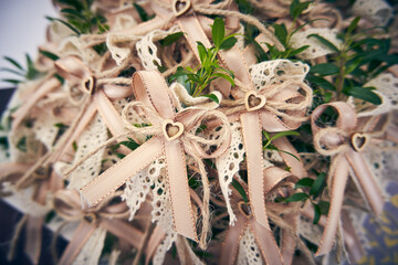 Wedding decoration, which is pinned on the dresses of the wedding guests