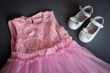 Pink girly dress and white shoes