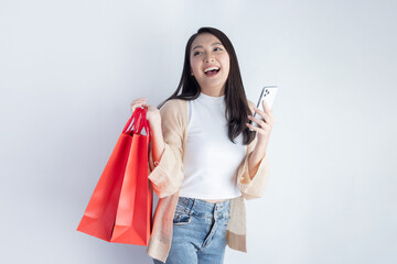 Woman Carrying Red Shopping Bag, and Mobilephone with Happy Face
