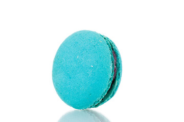 One sweet macaroon, close-up, isolated on white.