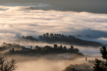 Obraz na płótnie Canvas hilly mountain landscape with fog at dawn