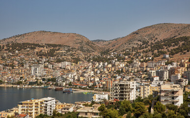 Fototapeta na wymiar Seascape with cityscape of Saranda. Albania