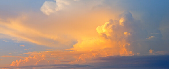 sunrise and cumulus cloudson on Blue sky.