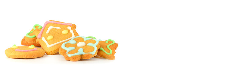 Gingerbread cookies isolated on white. Free space for text. Wide photo.