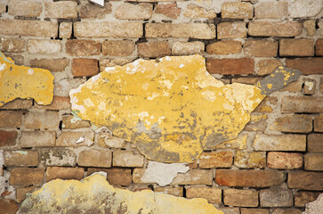 Old weathered brick damaged wall 