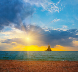 sail yacht silhouette among quiet emerald sea at the dramatic sunset, summer sea beach vacation scene